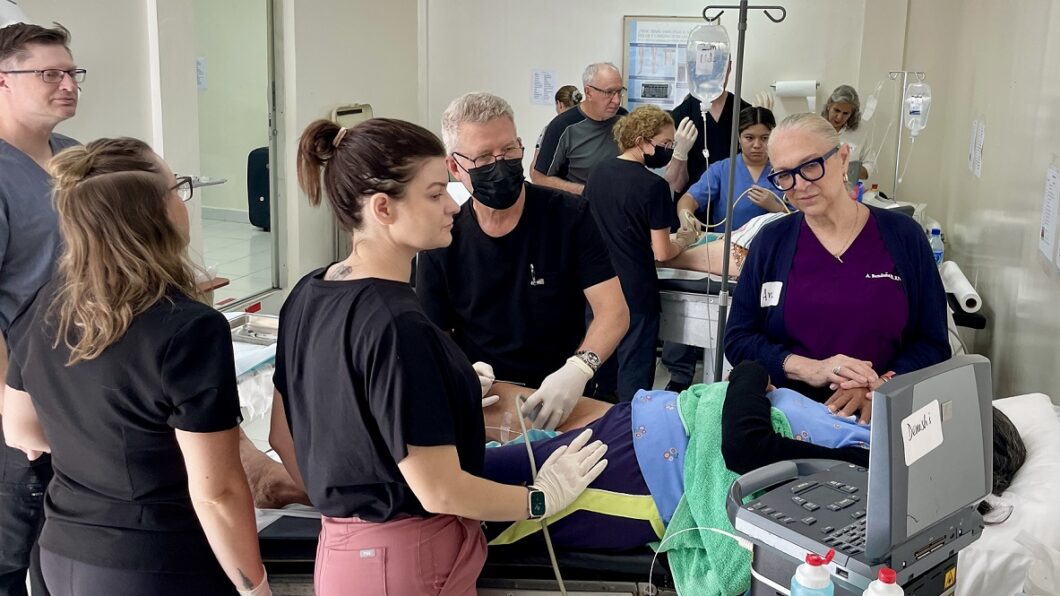 Volunteers help to care for patients together