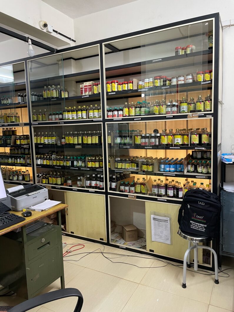 Large medicine cabinet of the Institute of Applied Dermatology (IAD) with medicines that are available on site.